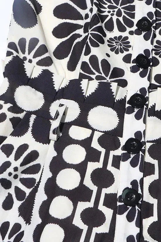 Vintage Floral Polka Dot Romper with Smocked Back, Square Neckline, and Slanted Pockets in Black and White-5