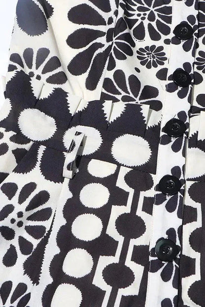 Vintage Floral Polka Dot Romper with Smocked Back, Square Neckline, and Slanted Pockets in Black and White-5