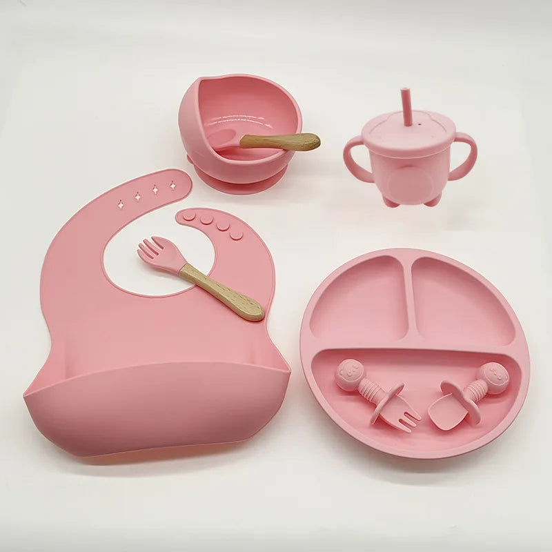 Baby-Silikon-Geschirrset 8-teilig Saugnäpfe Schalen Geteilter Teller Lätzchen Löffel Gabel Fall 2025 Selbstfütterungshilfe