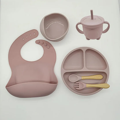 Baby-Silikon-Geschirrset 8-teilig Saugnäpfe Schalen Geteilter Teller Lätzchen Löffel Gabel Fall 2025 Selbstfütterungshilfe
