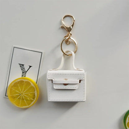 1+1 Gratis Birkin Inspiriert Mini Handtasche - Einfarbige PU Leder Münztasche Schlüsselanhänger Charm