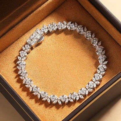 Pulsera de tenis de moissanita en plata de ley floral nupcial