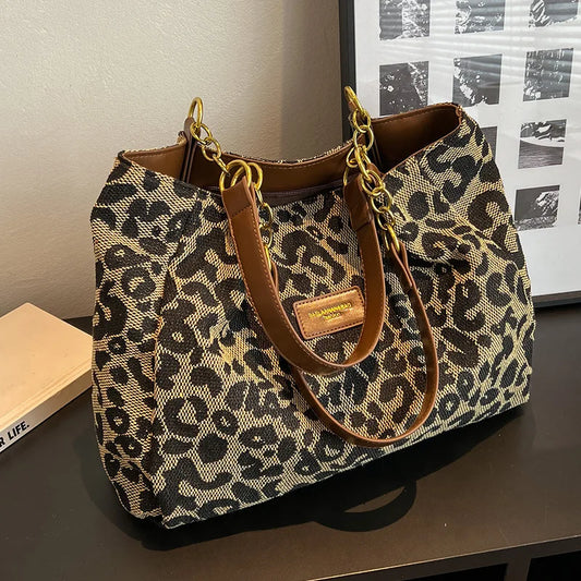 Leopardprint stor taske med stor kapacitet, daglig håndtaske med rummeligt indre, efterår 2026 trend gaveidé