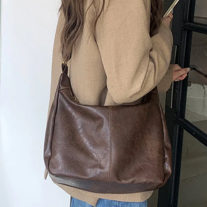 Zachte veelzijdige dames hobo tas - slouchy, nep leer