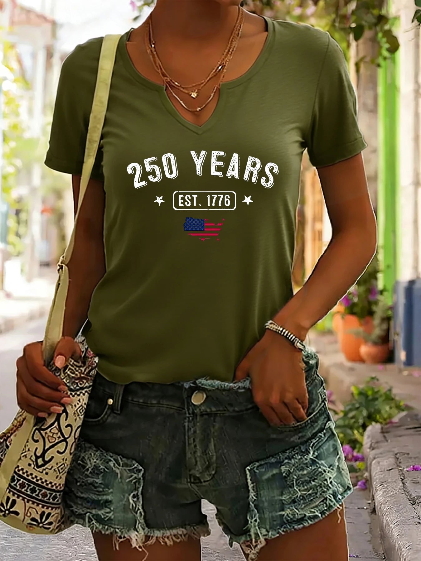 Breathable women's t-shirt – V-neck, short sleeve, patriotic EST.1776 USA print, casual top