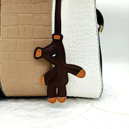 Björn nyckelring PU-läder mini väska charm söt gåva accessoar