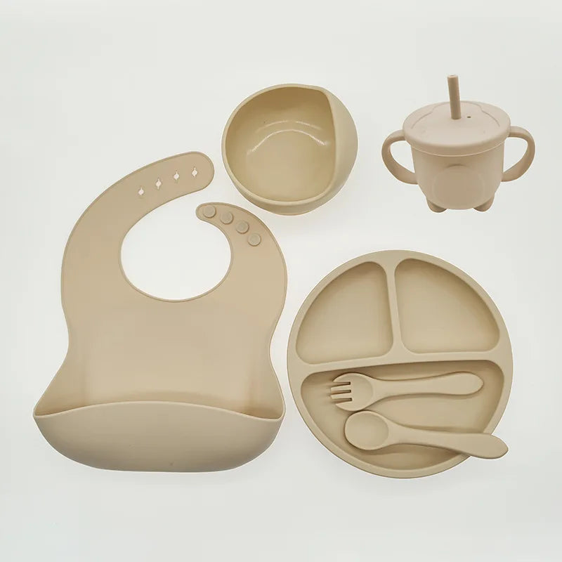Baby-Silikon-Geschirrset 8-teilig Saugnäpfe Schalen Geteilter Teller Lätzchen Löffel Gabel Fall 2025 Selbstfütterungshilfe