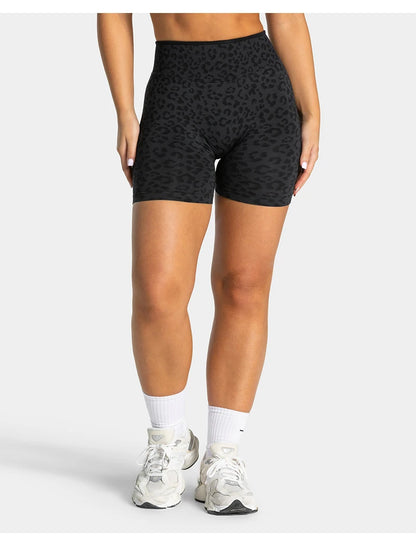 Stretchy women's seamless yoga shorts - high-waist hip-lifting, nylon blend, for gym and running