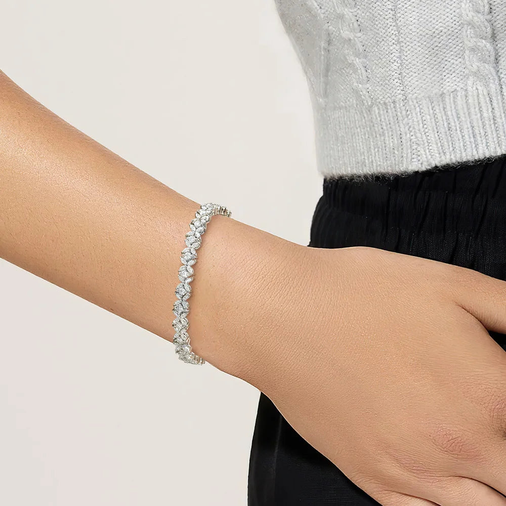 Pulsera de tenis de moissanita en plata de ley floral nupcial