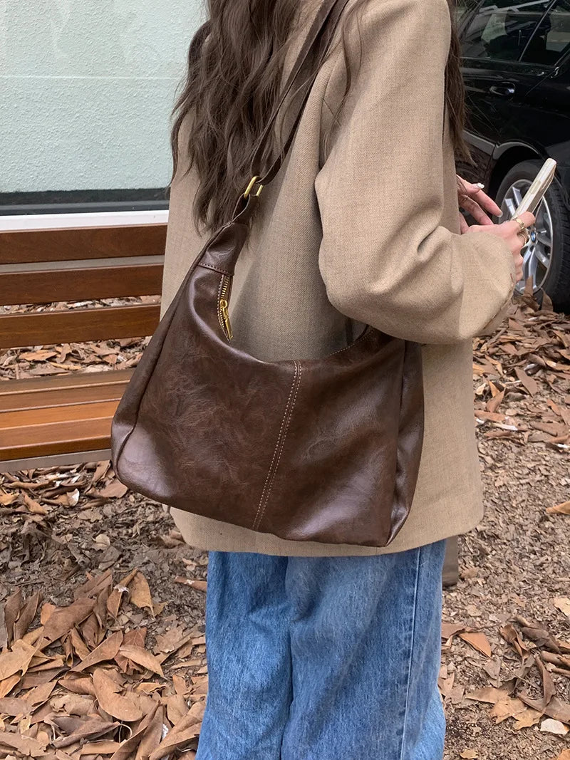 Zachte veelzijdige dames hobo tas - slouchy, nep leer