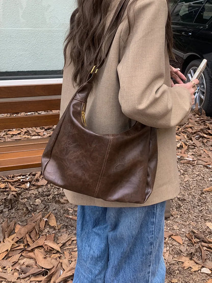 Zachte veelzijdige dames hobo tas - slouchy, nep leer