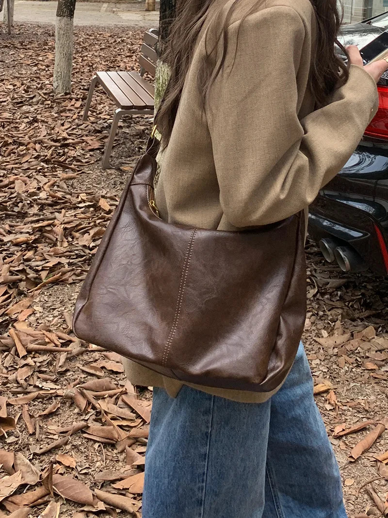 Zachte veelzijdige dames hobo tas - slouchy, nep leer