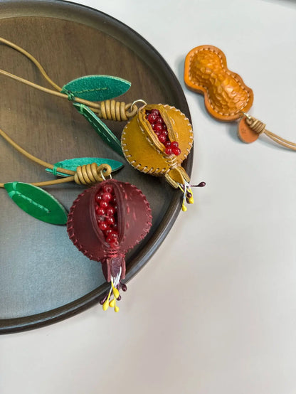 Portachiavi in pelle con ciondolo melograno per borsa e decorazione auto