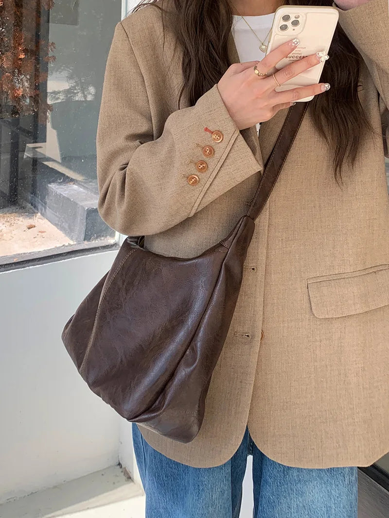 Zachte veelzijdige dames hobo tas - slouchy, nep leer