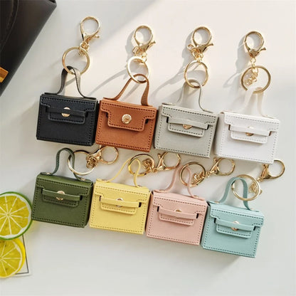 1+1 Gratis Birkin Inspiriert Mini Handtasche - Einfarbige PU Leder Münztasche Schlüsselanhänger Charm