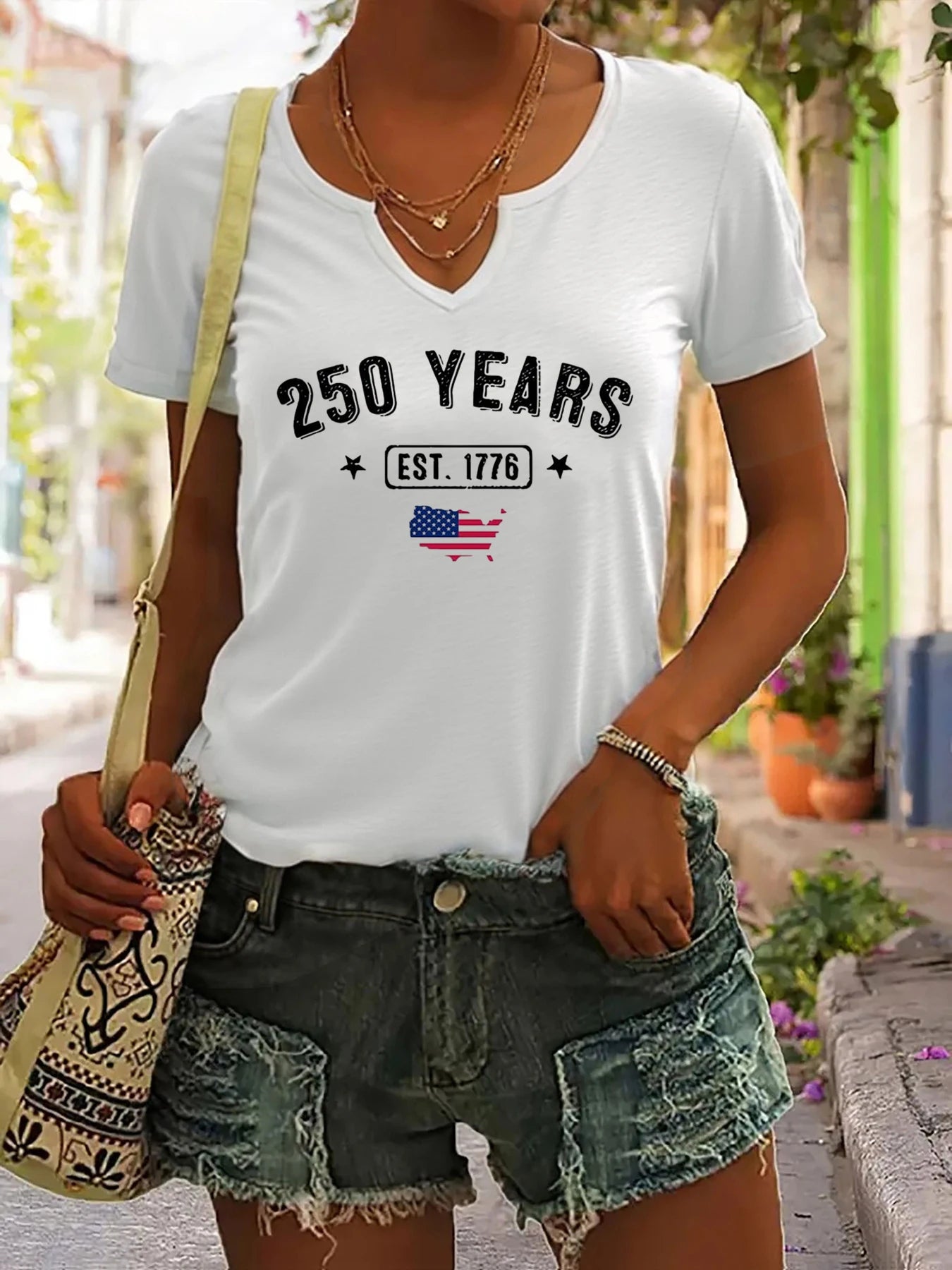 Breathable women's t-shirt – V-neck, short sleeve, patriotic EST.1776 USA print, casual top