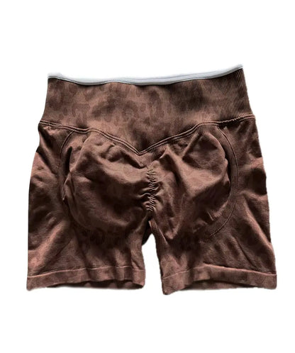 Stretchy women's seamless yoga shorts - high-waist hip-lifting, nylon blend, for gym and running