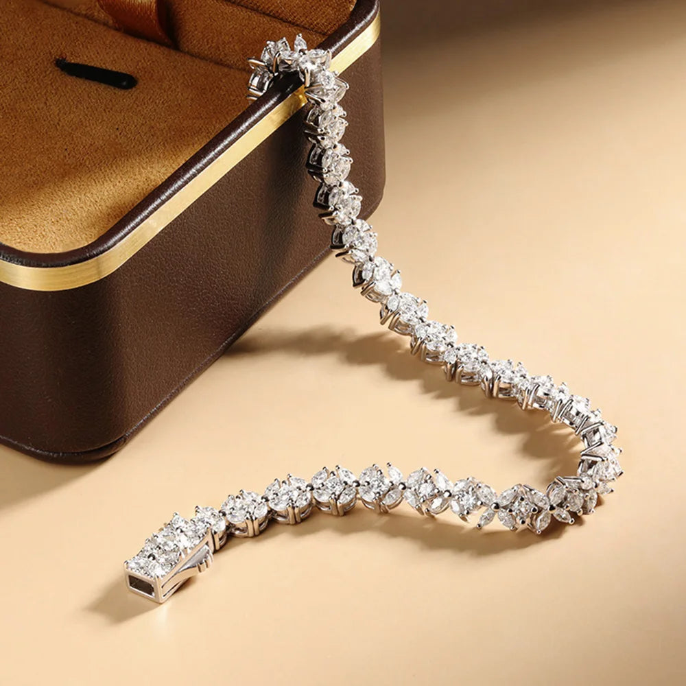 Pulsera de tenis de moissanita en plata de ley floral nupcial