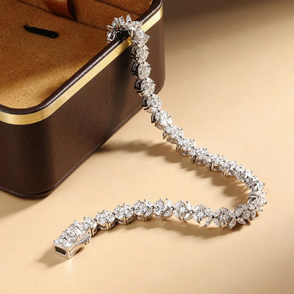 Pulsera de tenis de moissanita en plata de ley floral nupcial