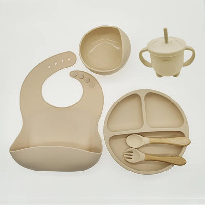 Baby-Silikon-Geschirrset 8-teilig Saugnäpfe Schalen Geteilter Teller Lätzchen Löffel Gabel Fall 2025 Selbstfütterungshilfe