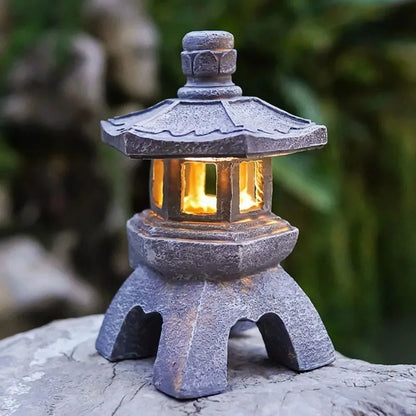 Lanterna solare pagoda in pietra resina ornamento da giardino stile zen cinese luce esterna decorazione ecologica autunno 2026
