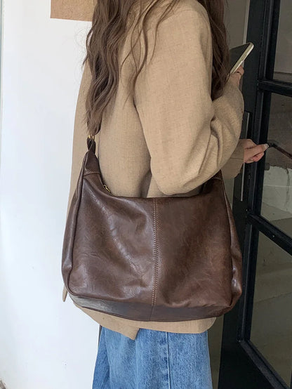 Zachte veelzijdige dames hobo tas - slouchy, nep leer