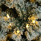 6ft Snow-Flocked Christmas Tree with 1202 Branches and Tied Lights – Perfect Holiday Decor for Christmas 2024